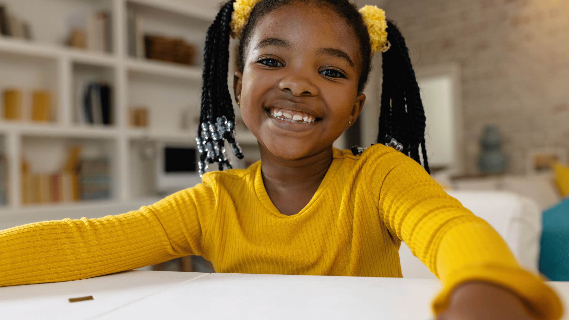 kid who will be successful as she organizes her things in a way that makes sense to her