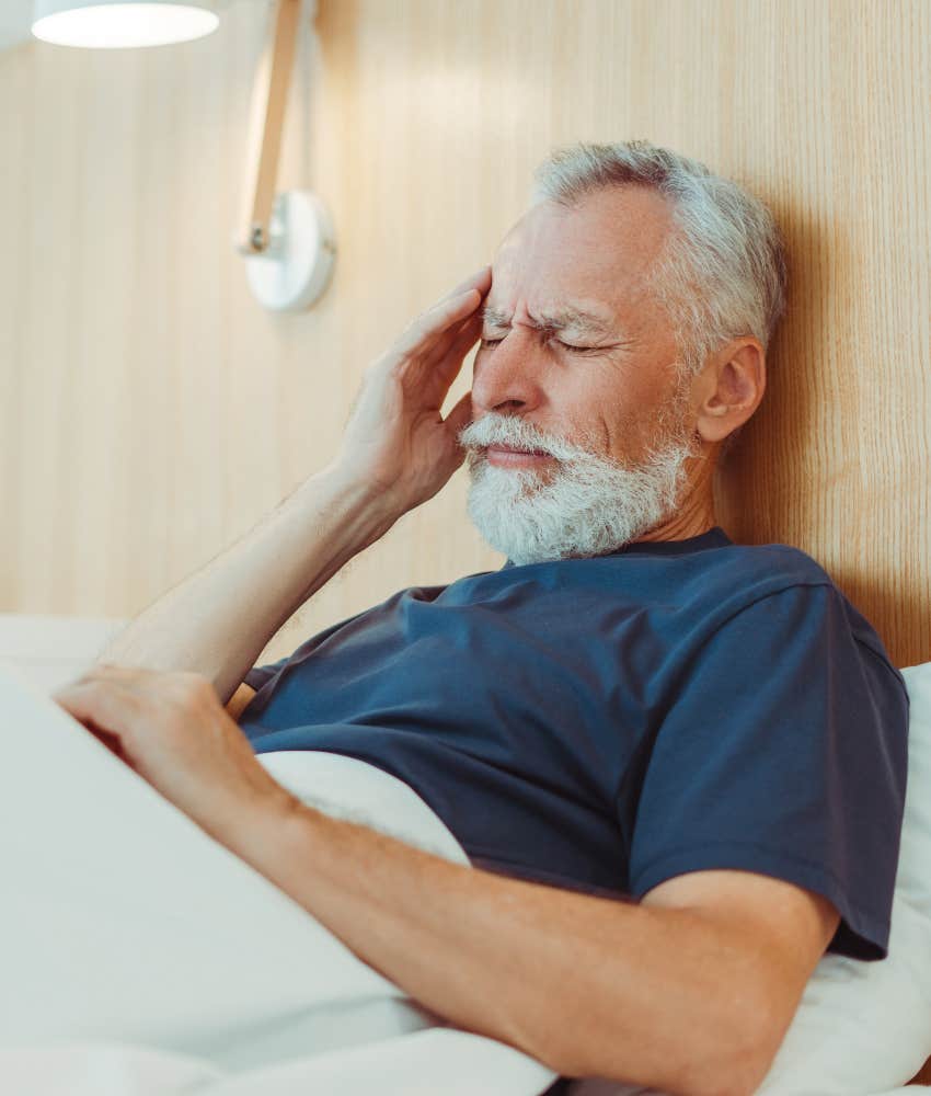 older person with pain stuck in bed 