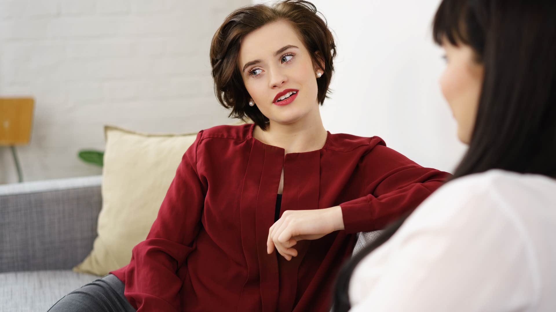 Woman asking "Have you gained weight?" to her friend.