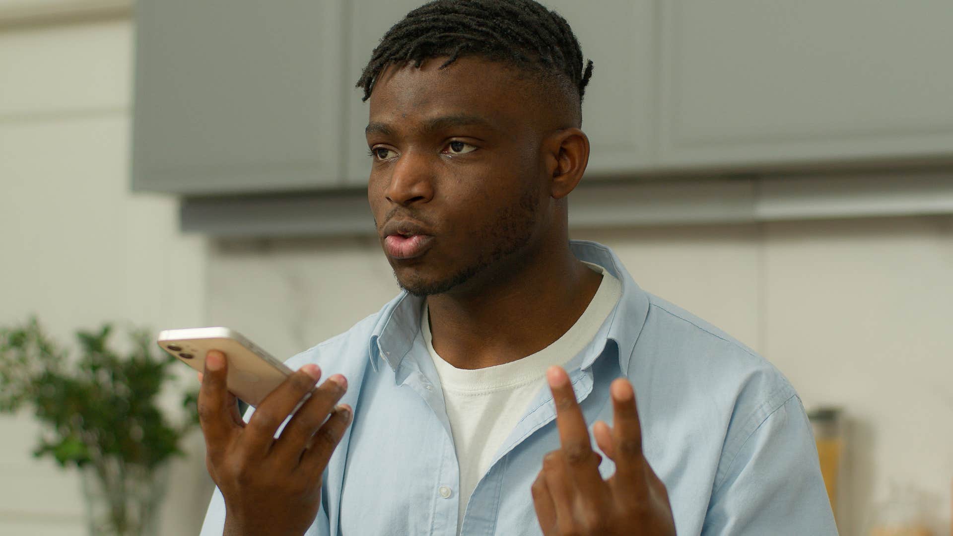 Nosy man asking "Why didn't you invite me?" on the phone.