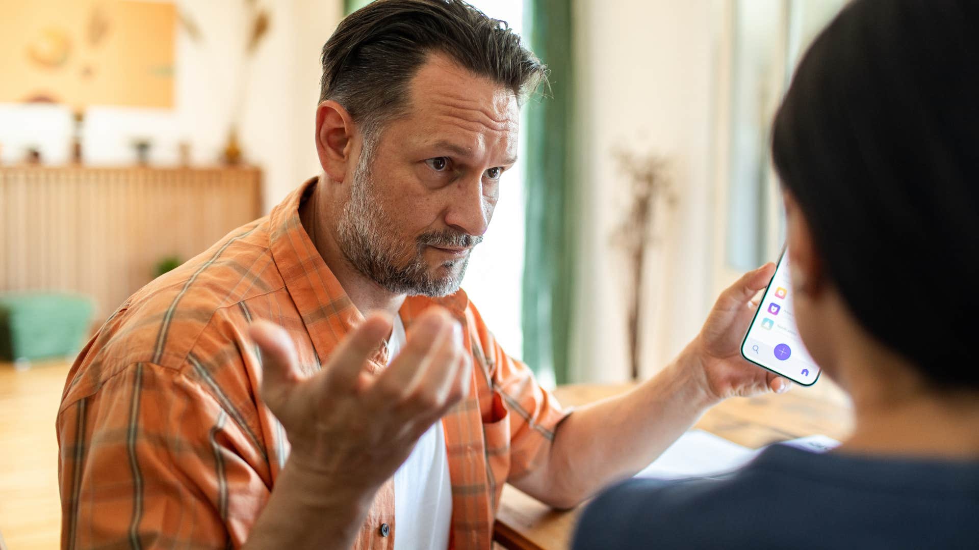 Man asking "Why don't you have kids?" to his adult daughter.