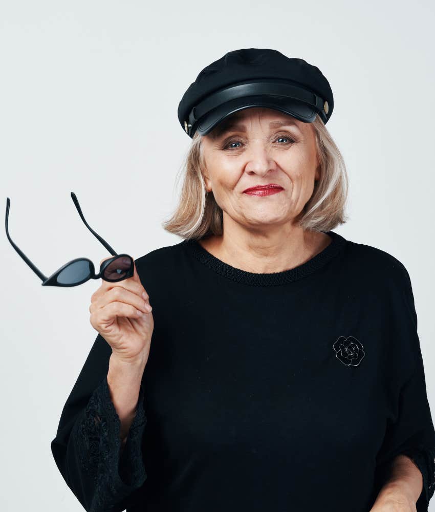 Carefree older woman showing wisdom