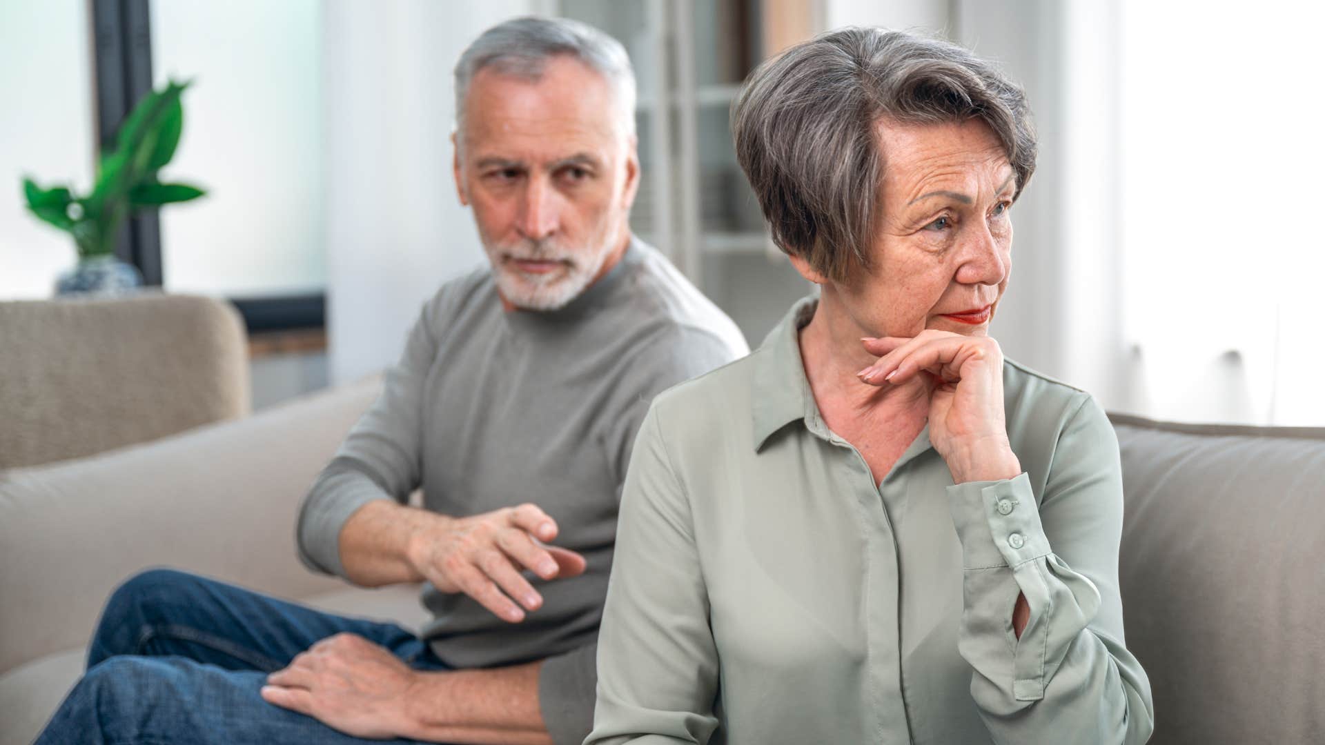 older person turns away showing distraction