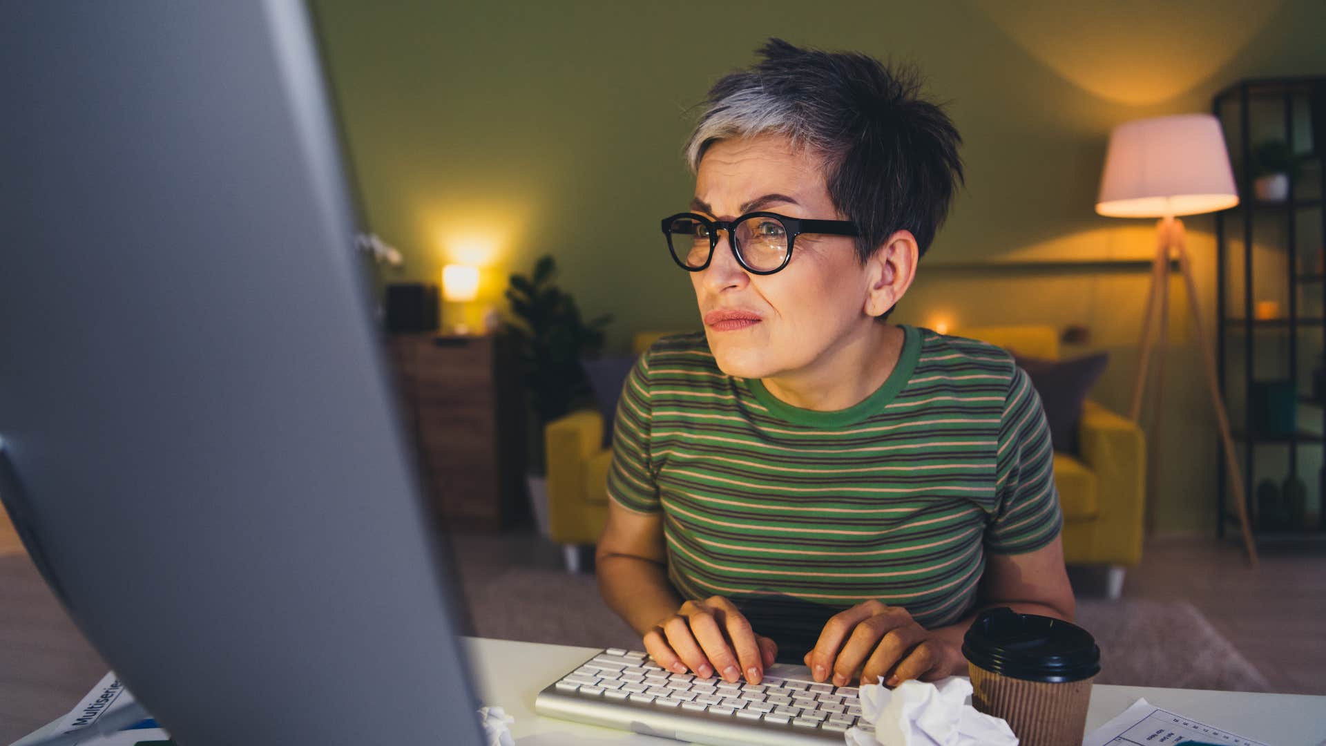 confused older person with computer showing impulsivity