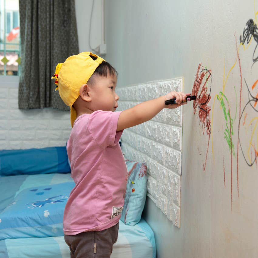 little boy drawing on walls doesn't understand that it's bad