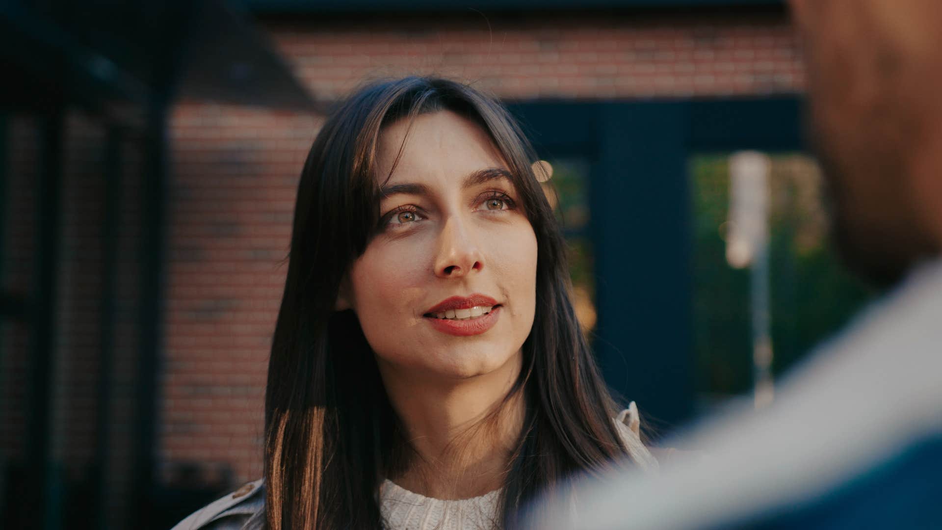woman who is an empath being direct with someone in a conversation