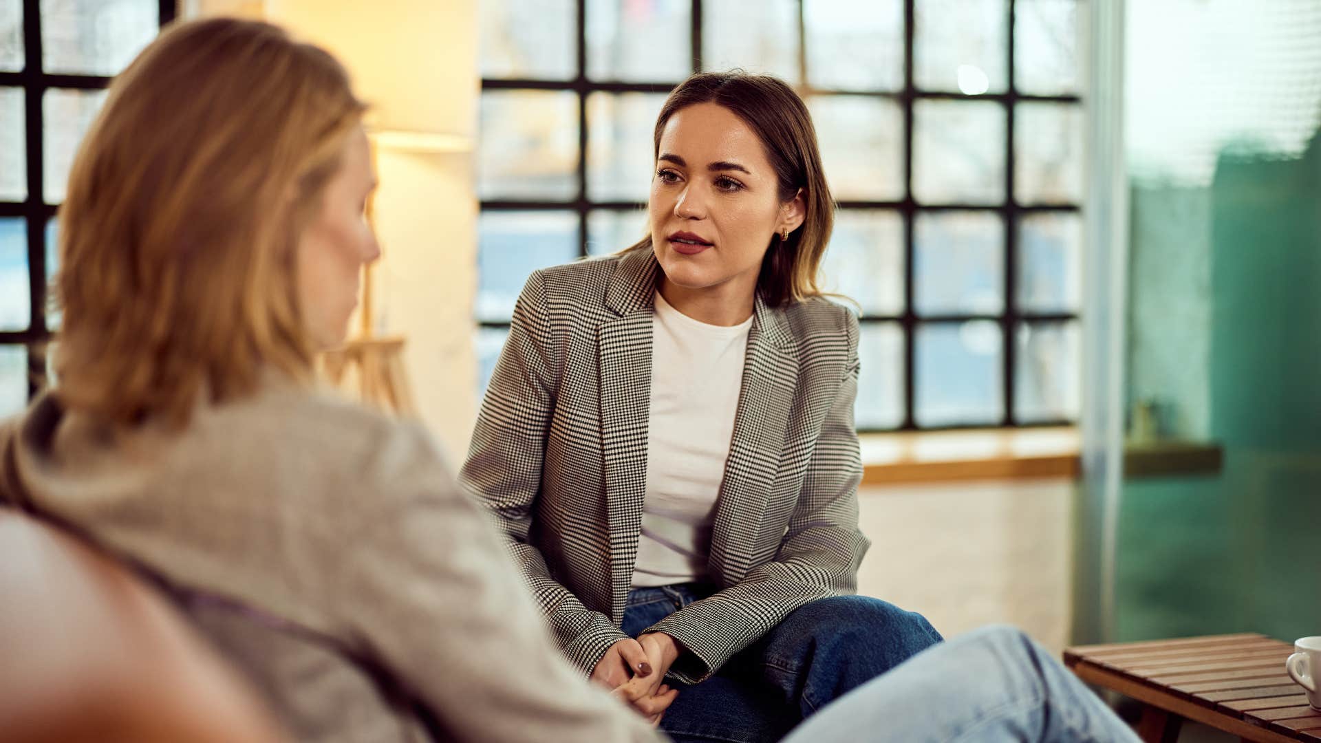 empathic woman no longer over-explaining herself to colleague