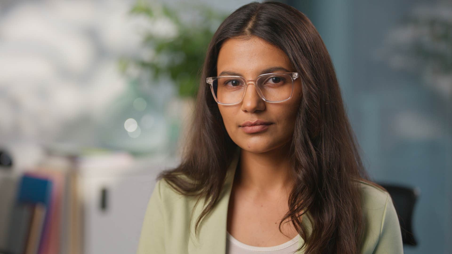 empathic woman with a strong sense of agency staring