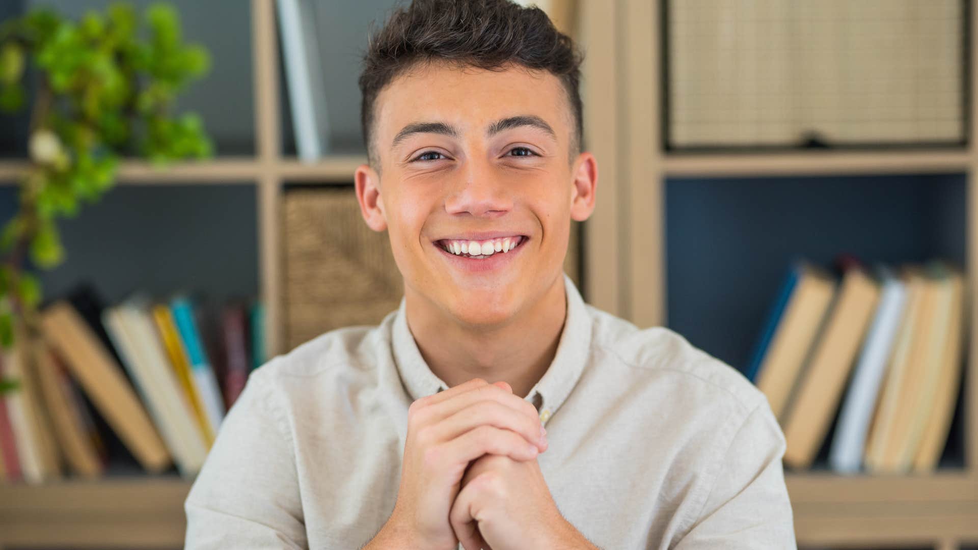 smiling empathic man trusting his gut to make decisions