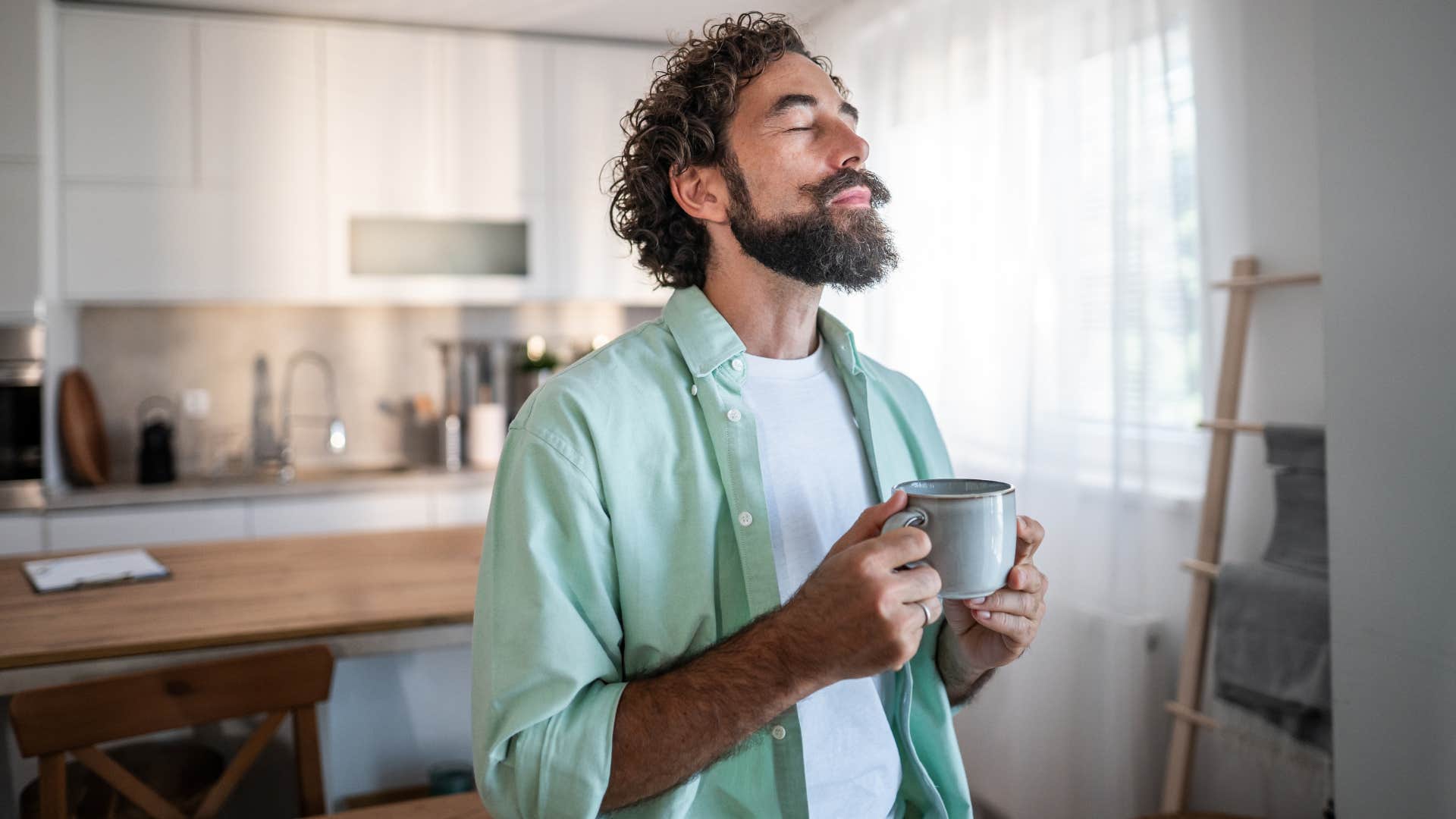 empathic man who understands his own needs relaxing at home
