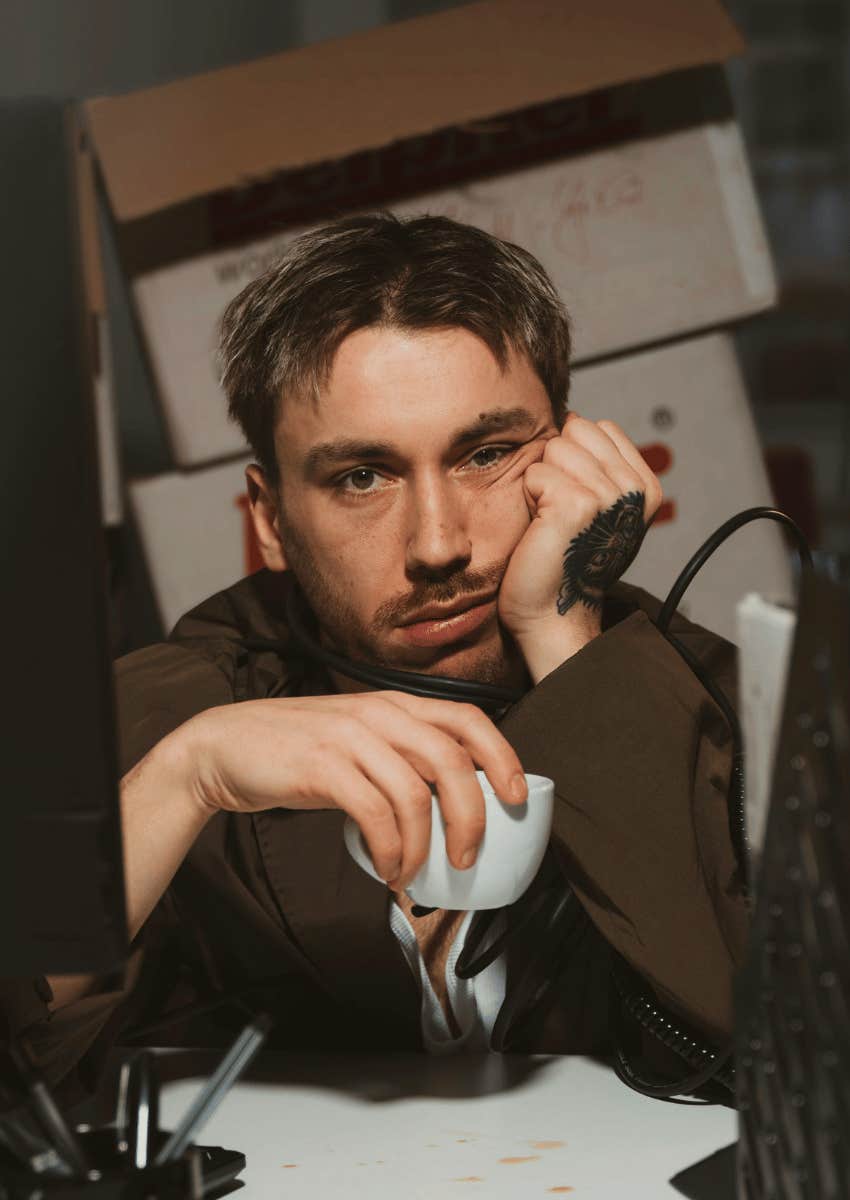 deflated employee sitting at work desk