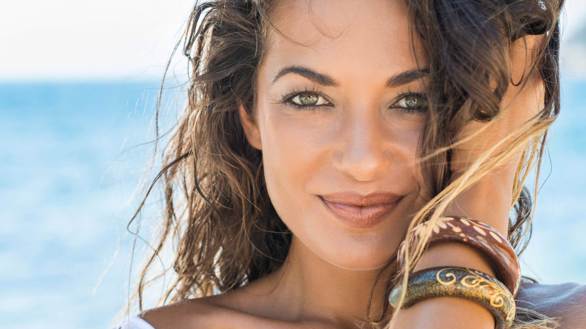 woman with unwavering confidence who attracts pretty much every man she meets