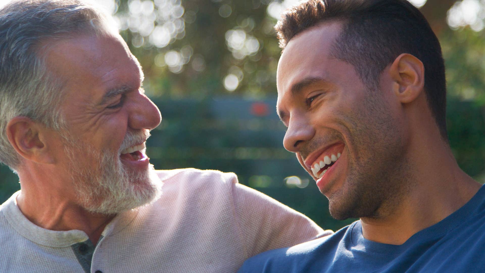 man with adhd who's full of energy and extraversion talking to friend smiling