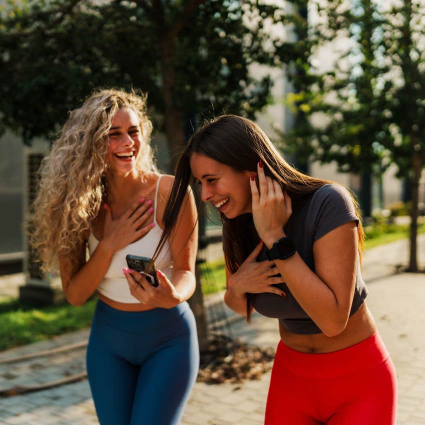 two extroverted friends enjoying positive humor together