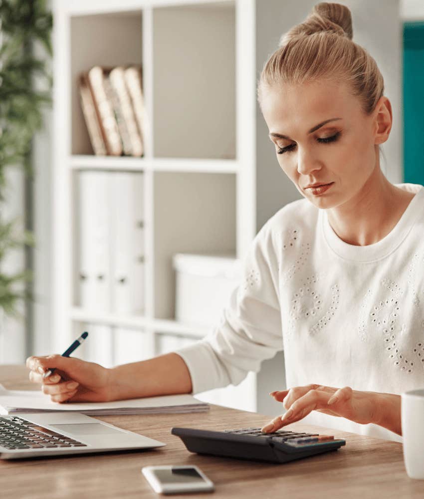 frugal woman who checks her finances regularly but not obsessively