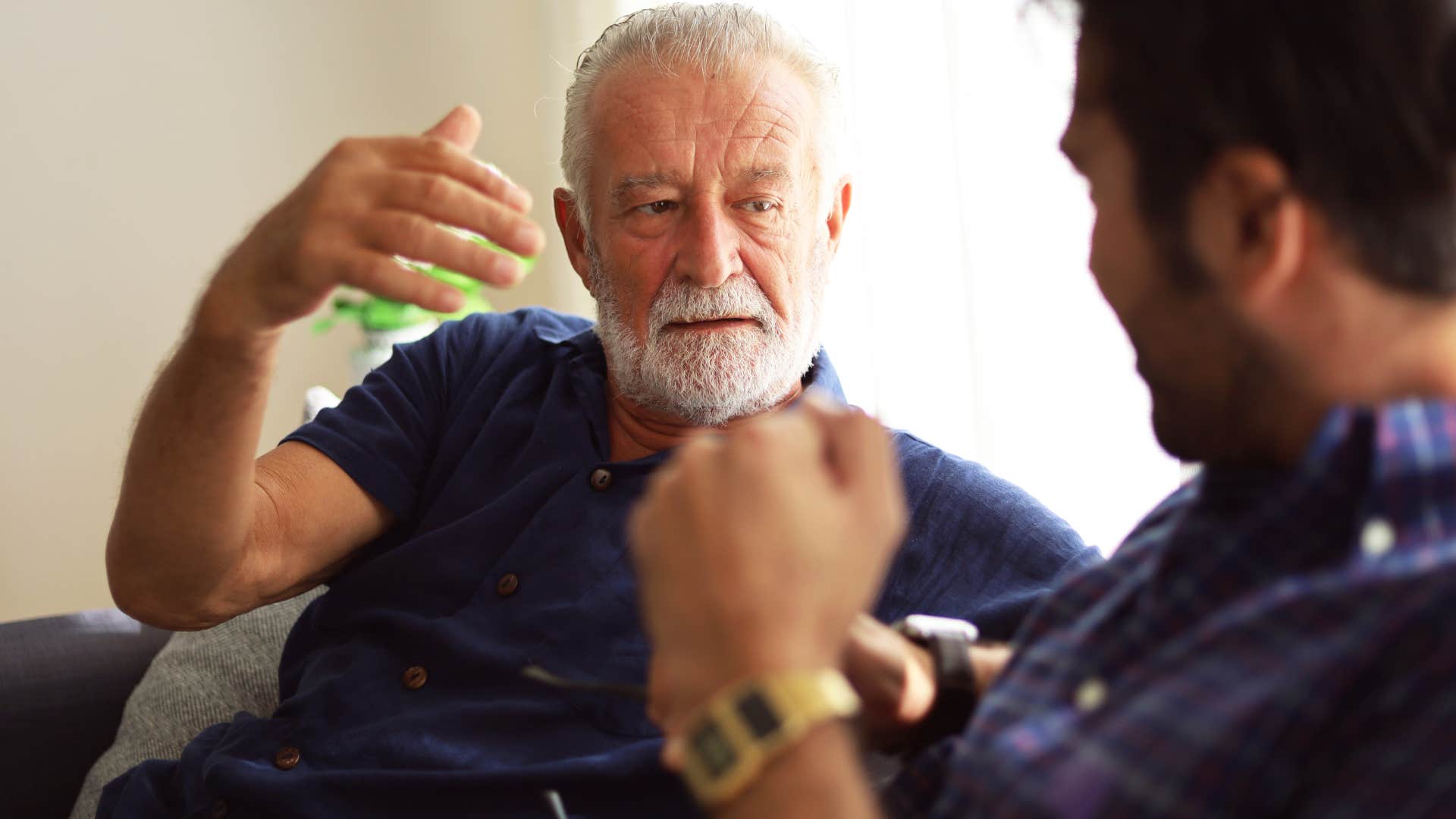 sad grandparent telling grandson I miss hearing your voice