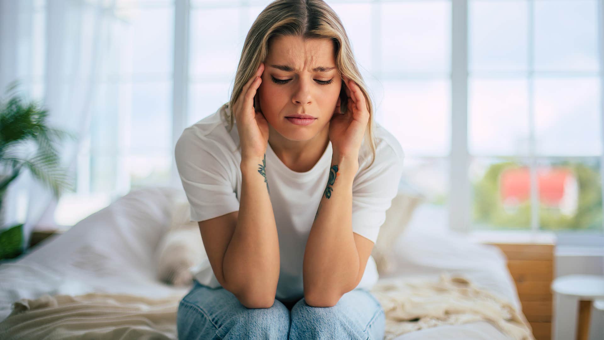 woman has a hard time celebrating her own successes