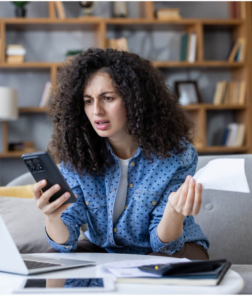 stressed woman with receipts showing control issue