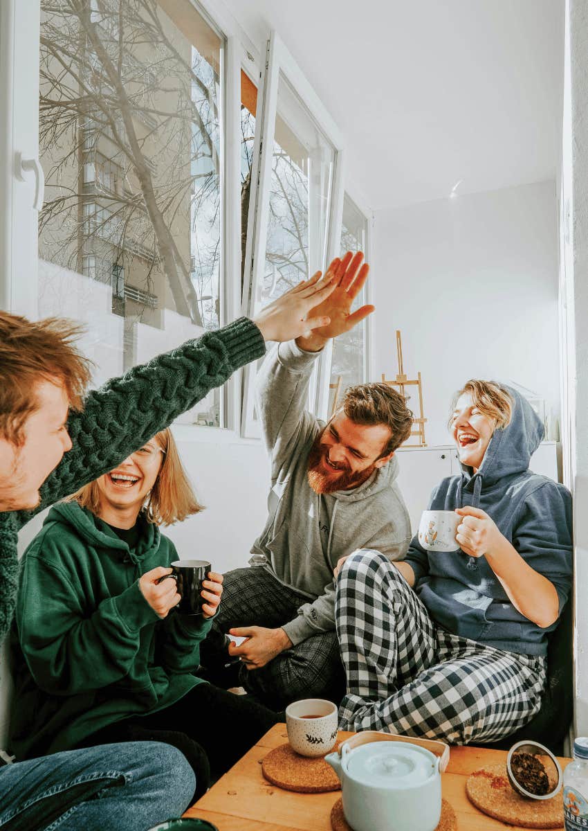 happy group of friends hanging out in a casual environment