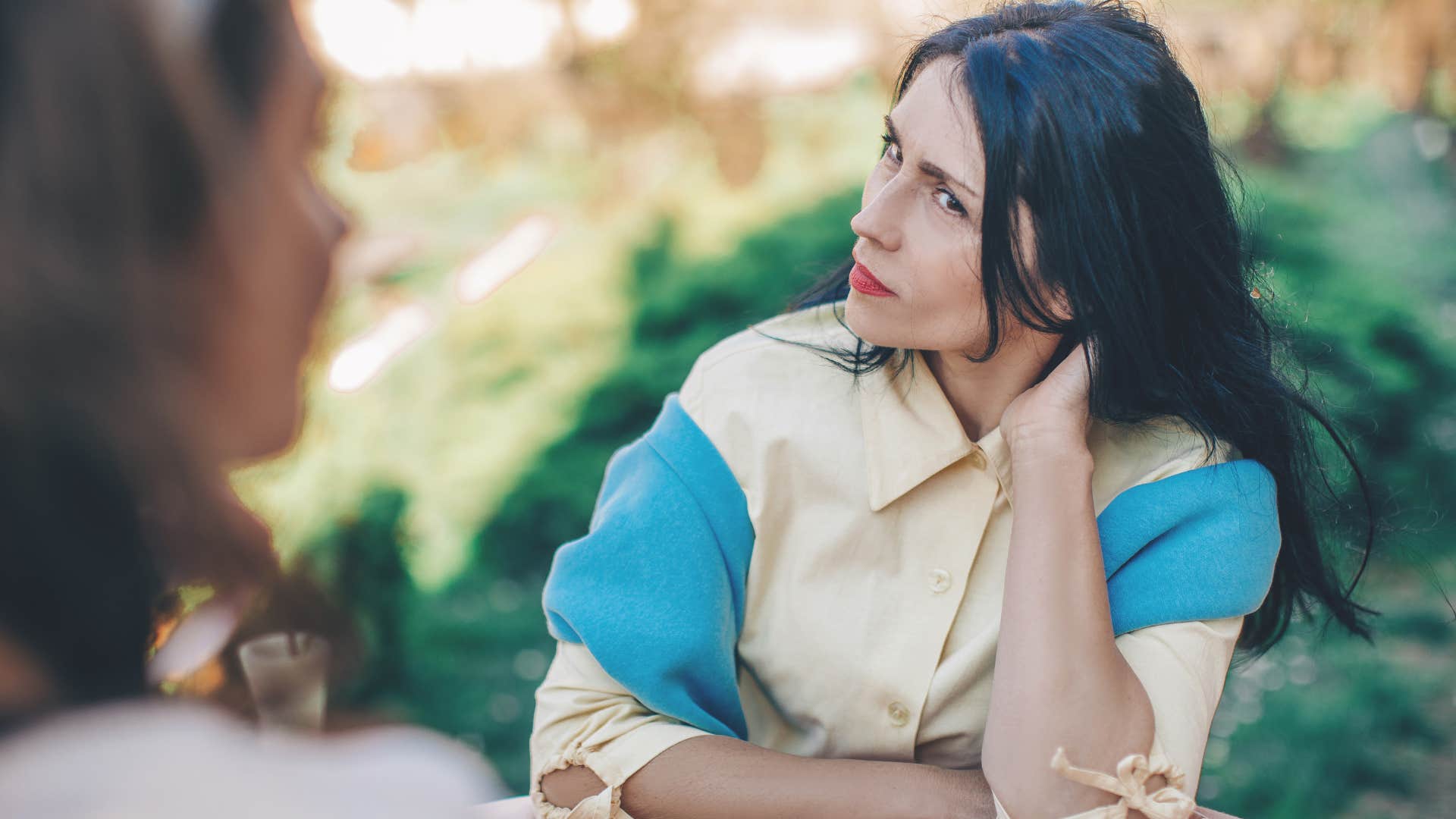 annoyed woman beginning to let go of people she's outgrown
