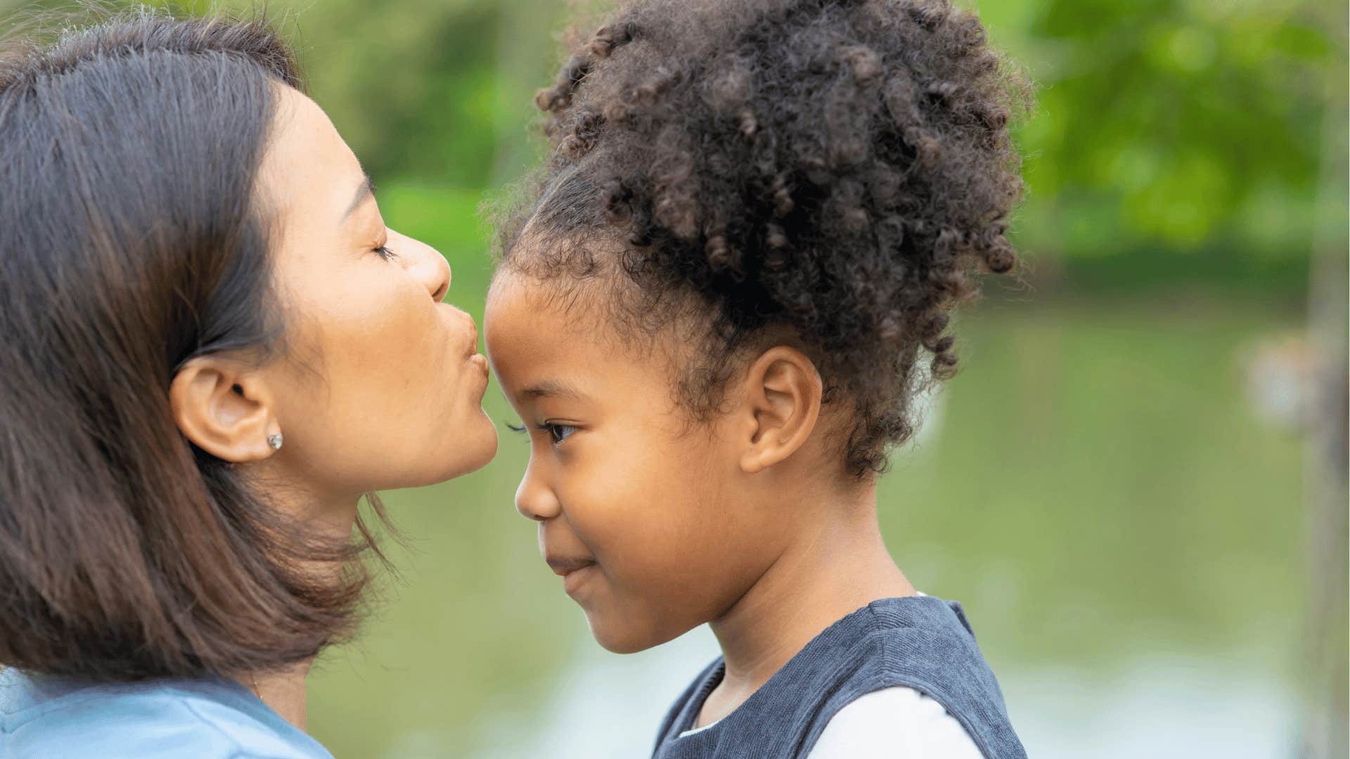 helicopter parent having a tender moment with her child