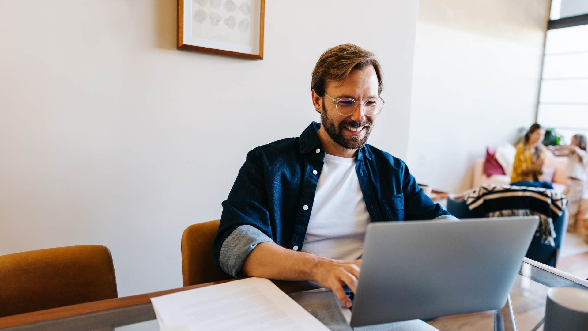happy man finding satisfaction in small victories at work