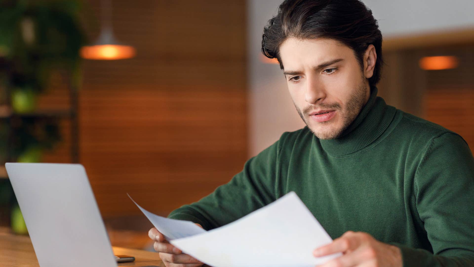 high-iq man concentrated being picky about details