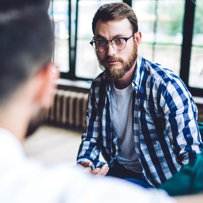 high-iq man having intense debate with his friend in public