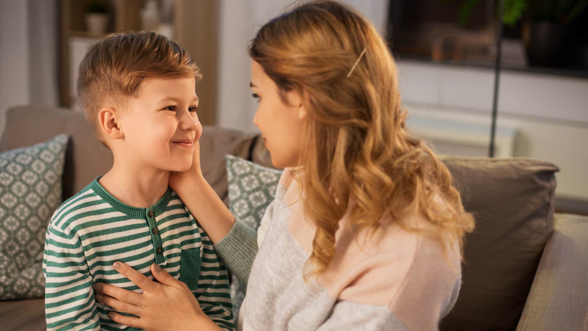 mom talking to her son raising him to be intelligent by saying think about it