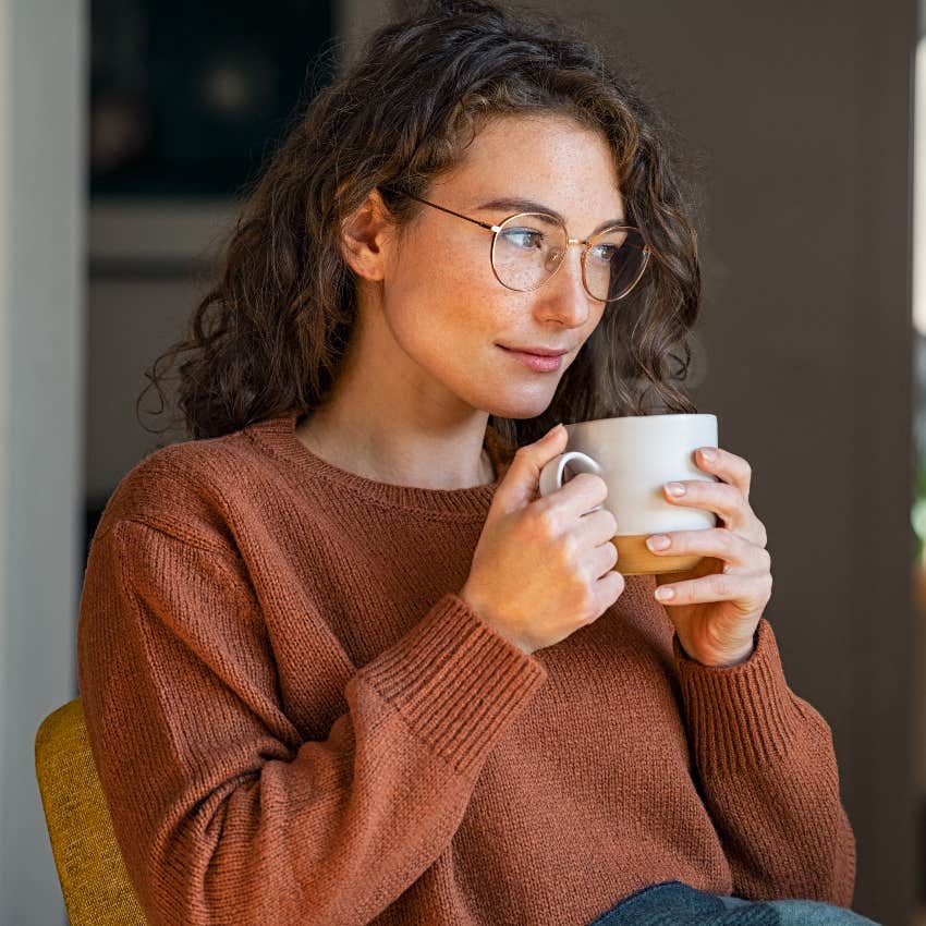 woman drinking coffee at home