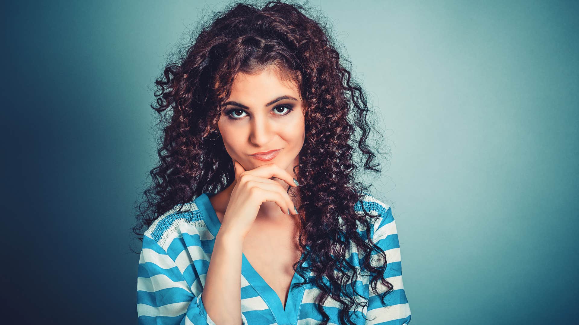Woman who uses kind phrases even though he's judging looking sneaky 