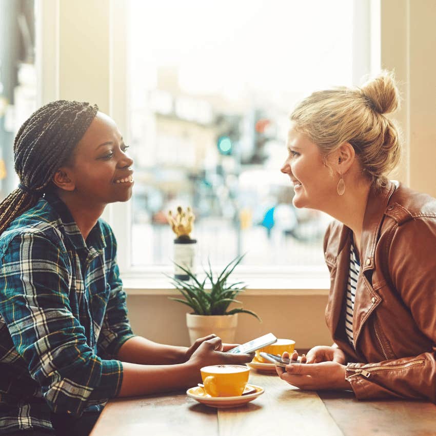 woman saying let's talk about you to her friend