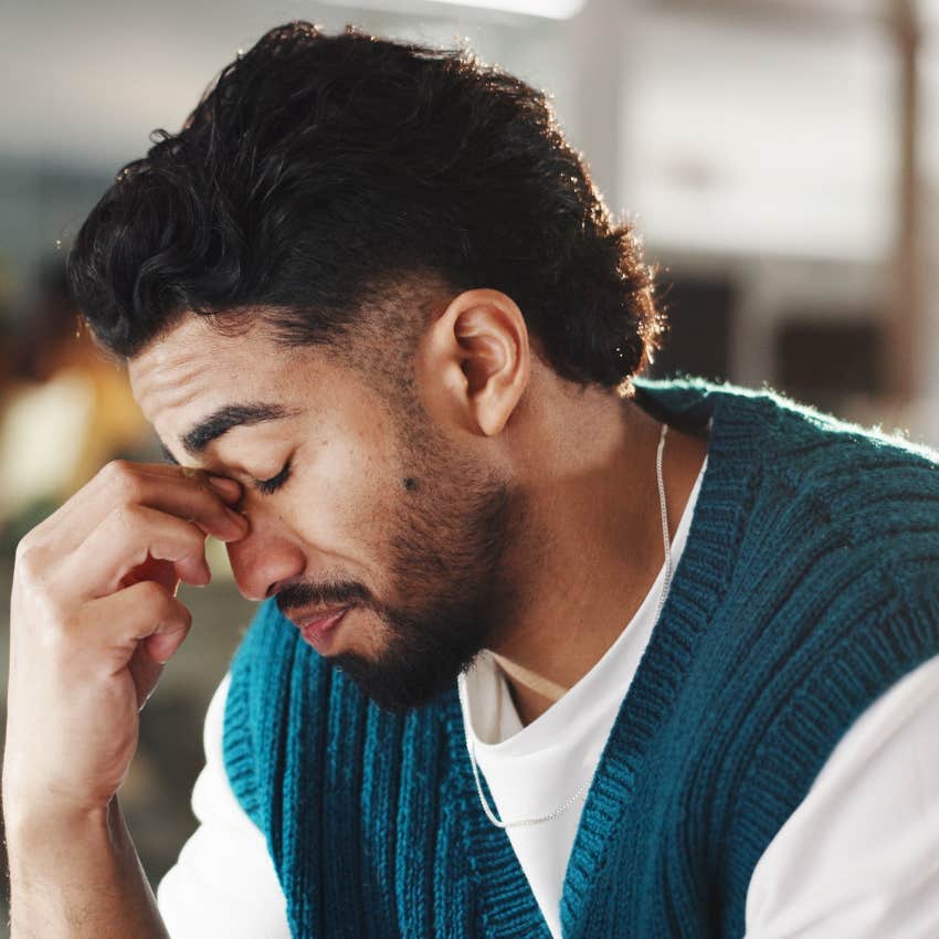 isolated man experiencing restlessness at work looking upset