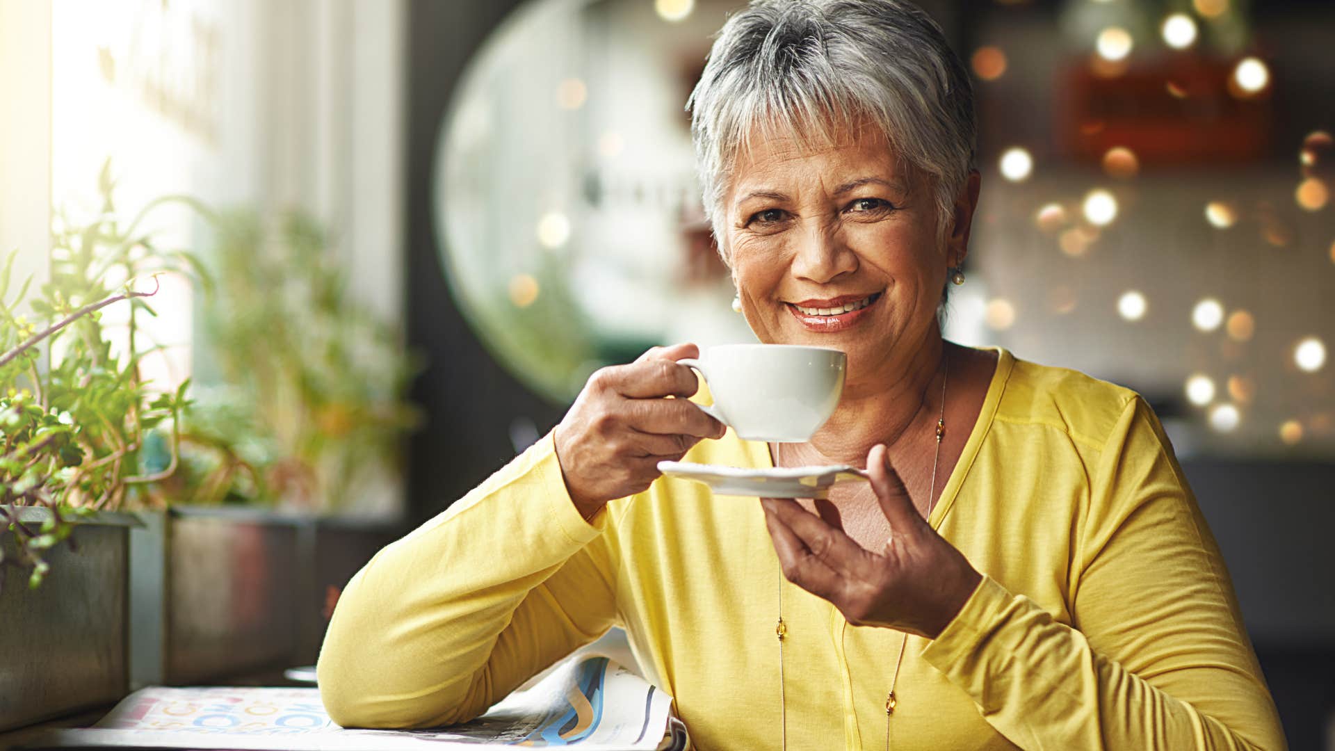 woman on a solo date at a coffee shop with herself