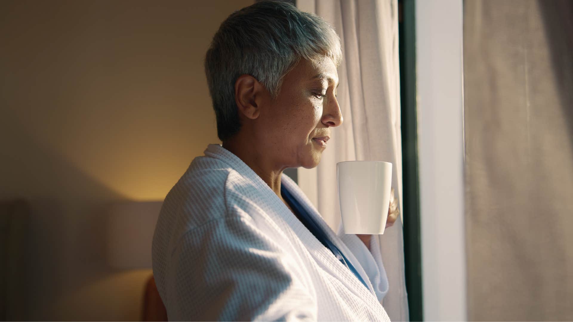 introverted woman embracing slow mornings and routines at home