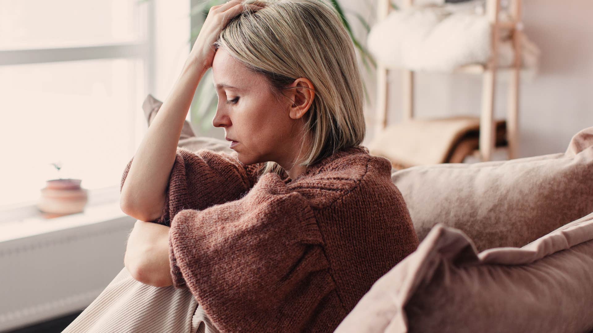 Woman feeling guilty for celebrating milestones at home.