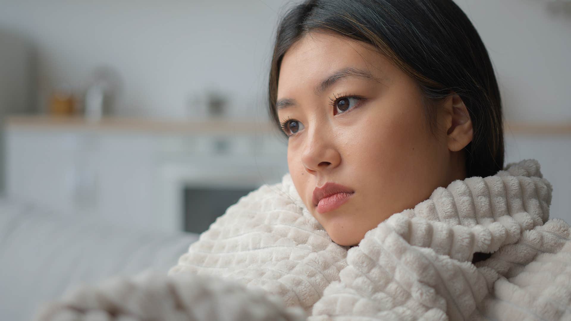 Woman outgrowing people and places at home.