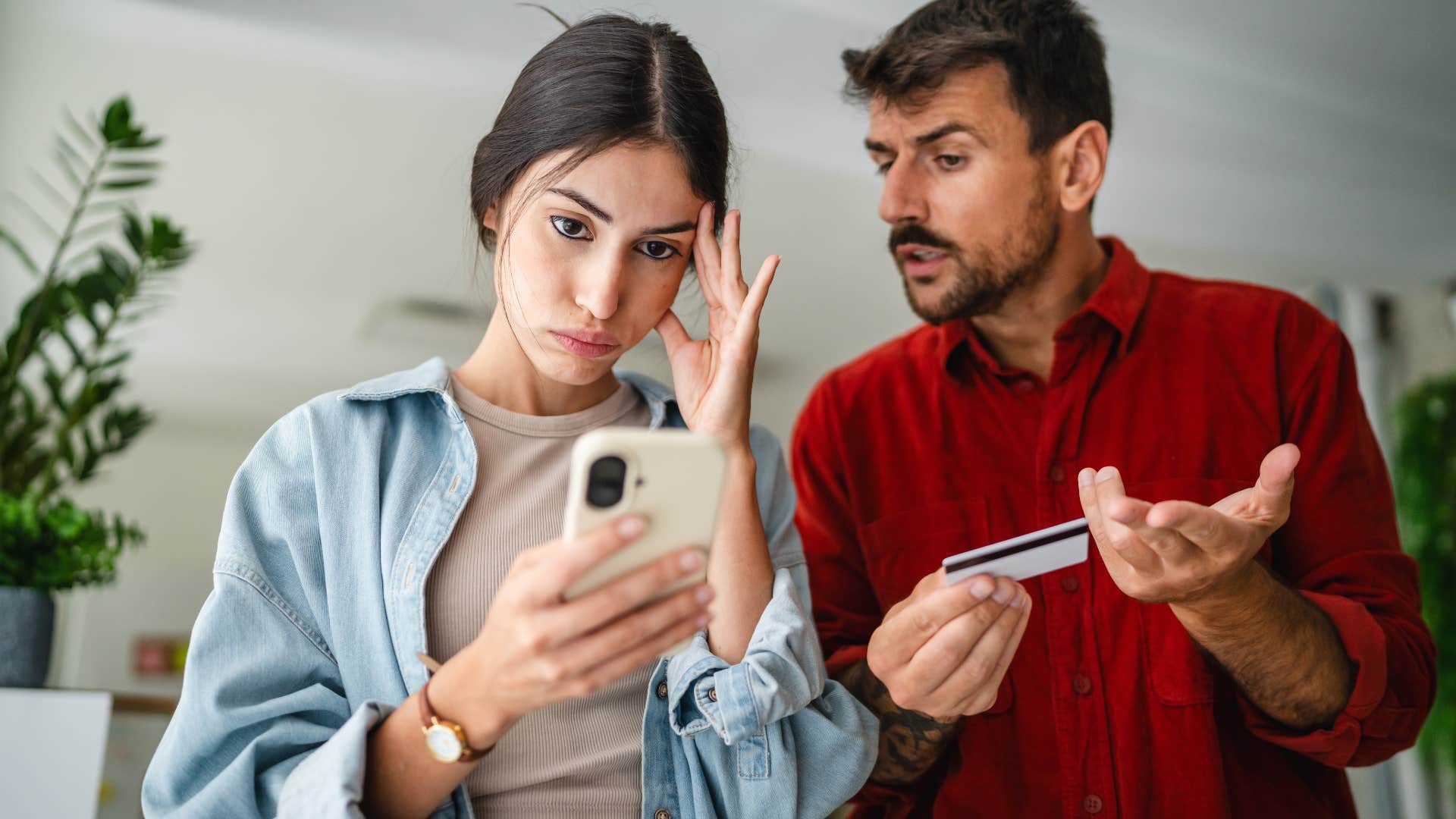 woman telling upset man you're being so emotional 