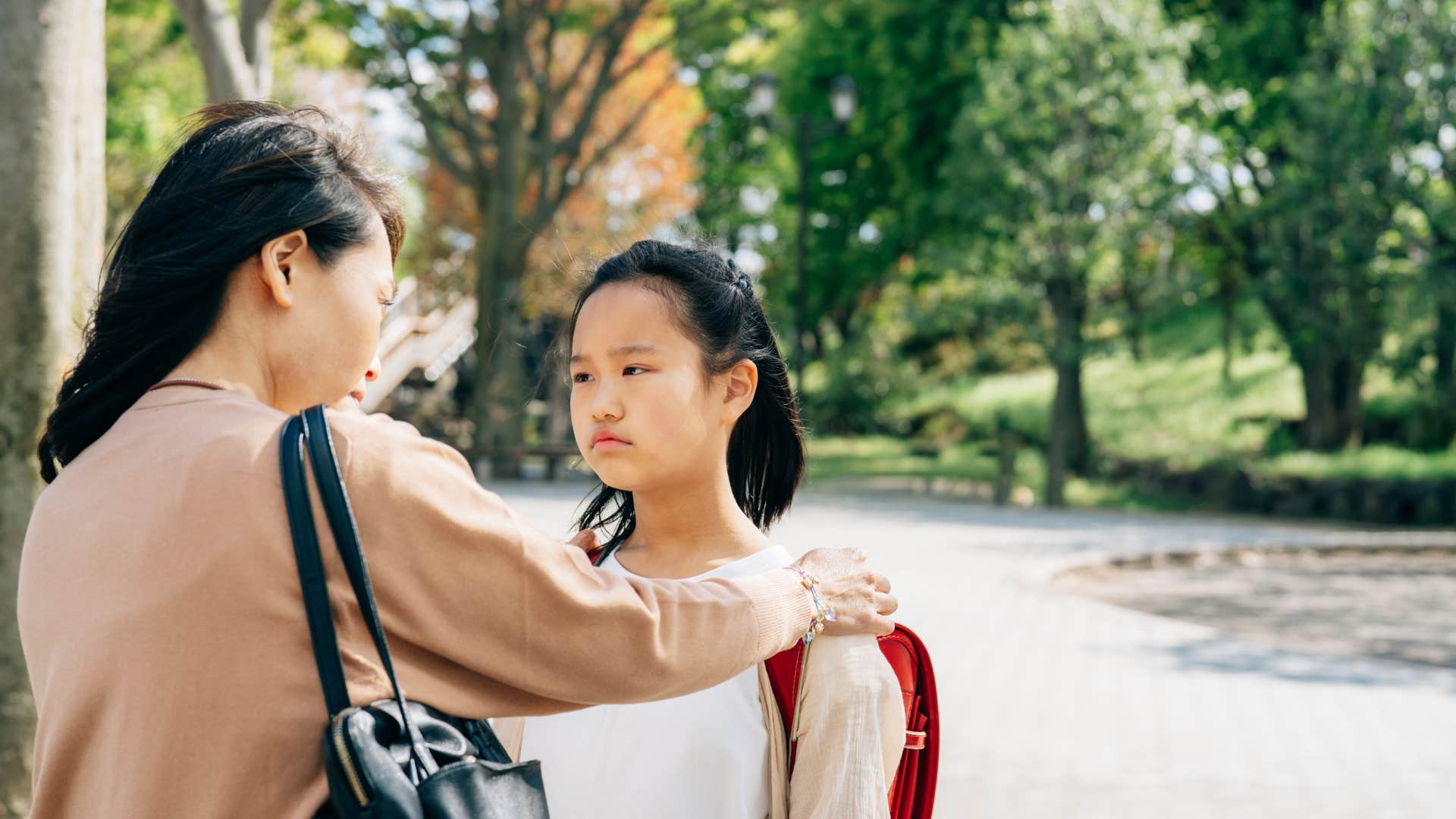 mom telling her daughter that it's good to stand by her opinions