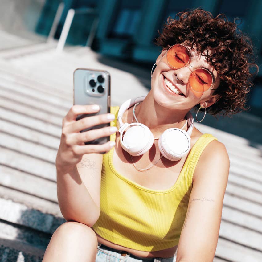 gen z woman with a healthy work life balance enjoying the sunshine