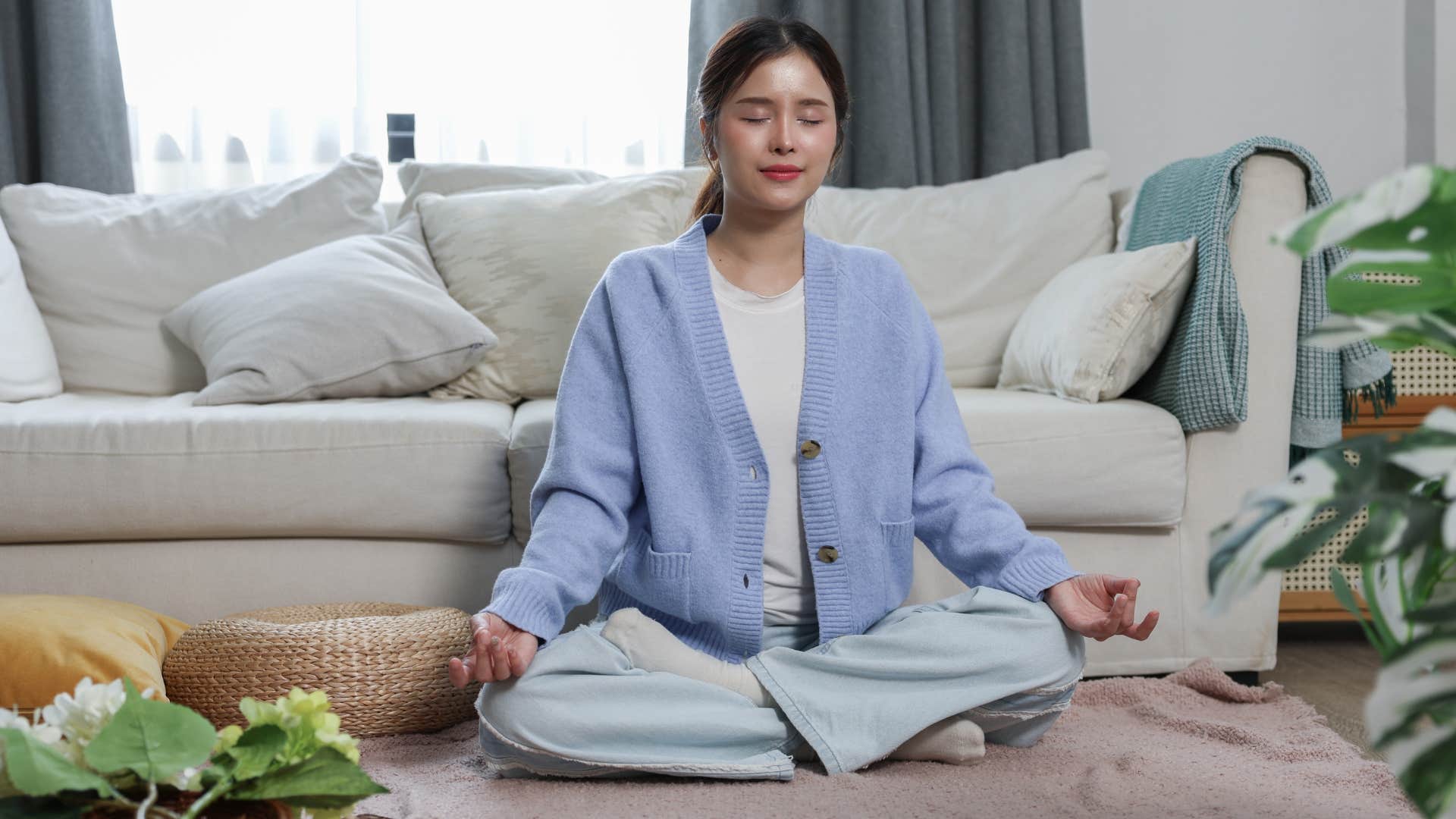 woman meditating to tolerate frustration