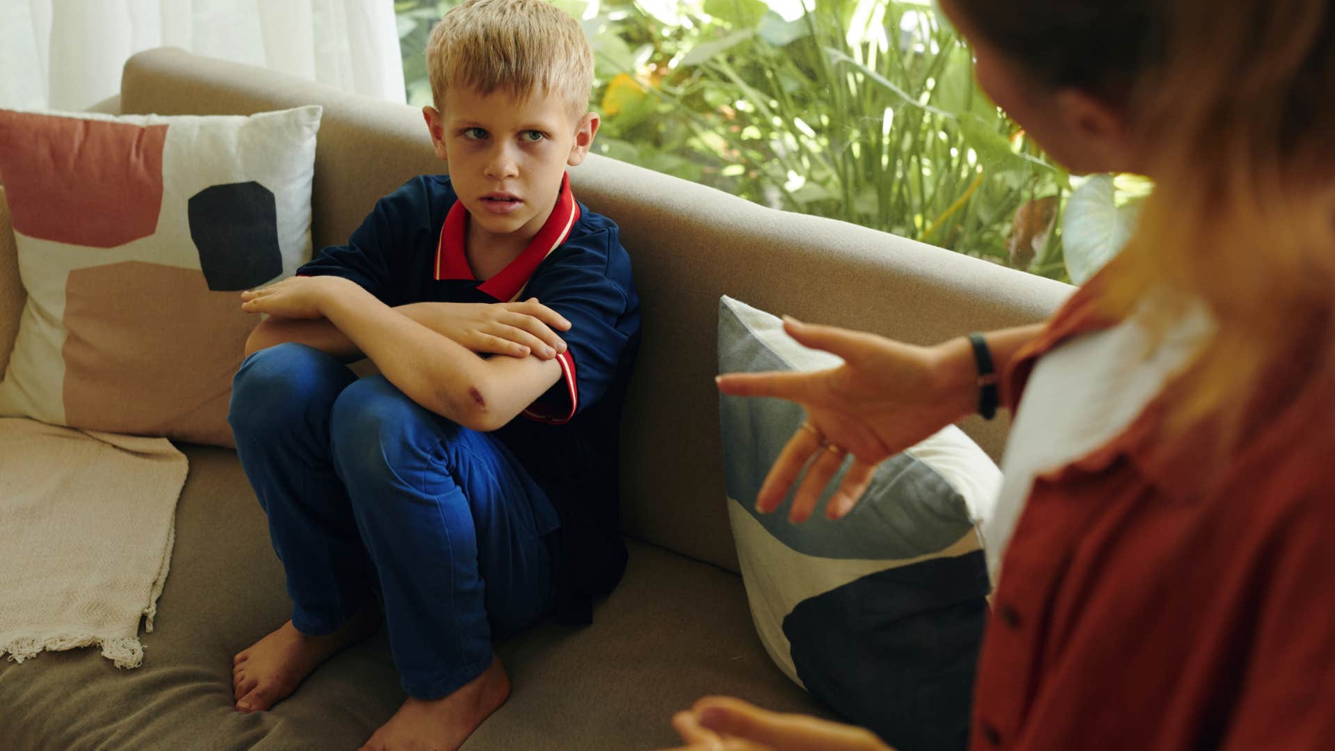 kittle boy keeping certain things private in a conversation with his mother