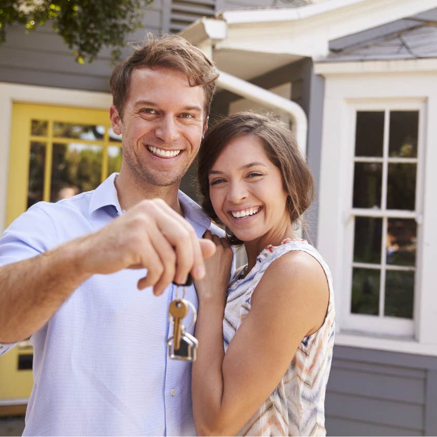 Couple with their starter home that 50 years ago anyone could afford
