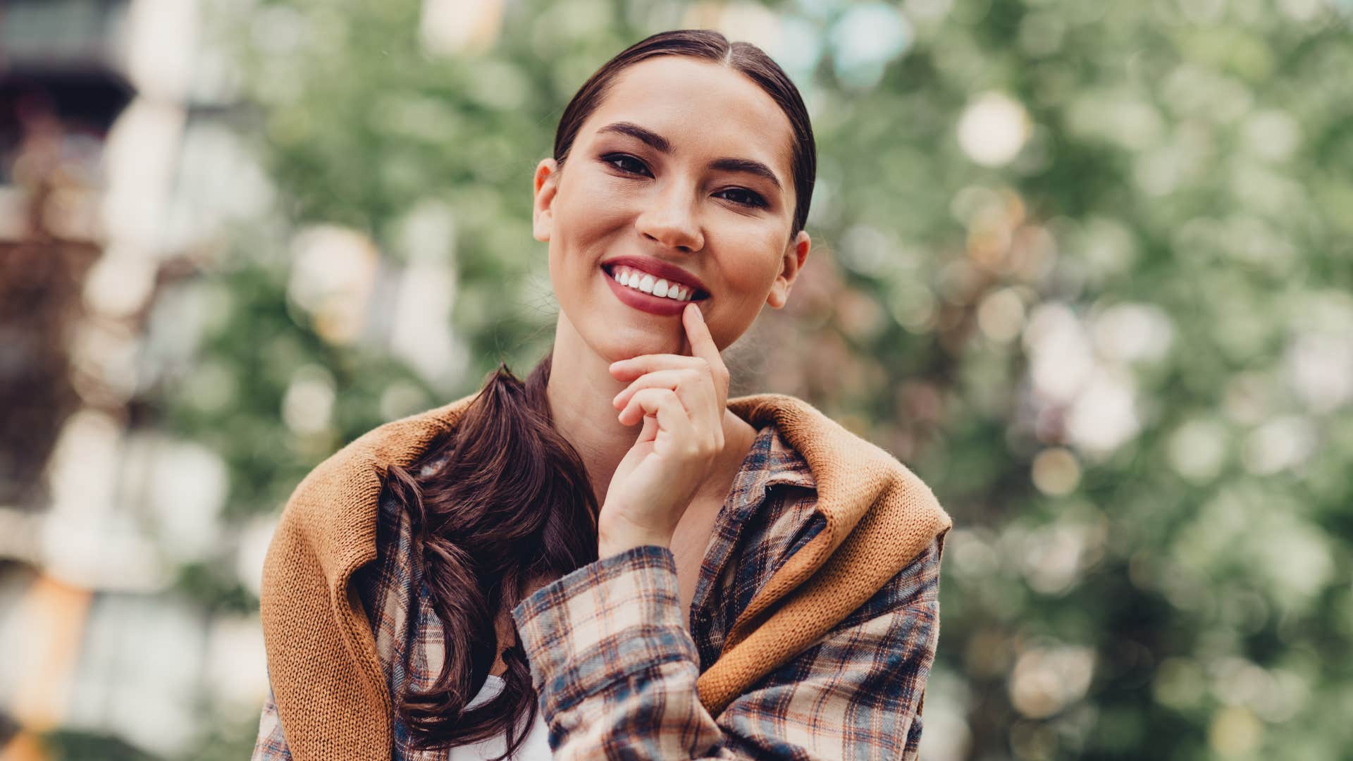 smiling young woman trusting her intuition