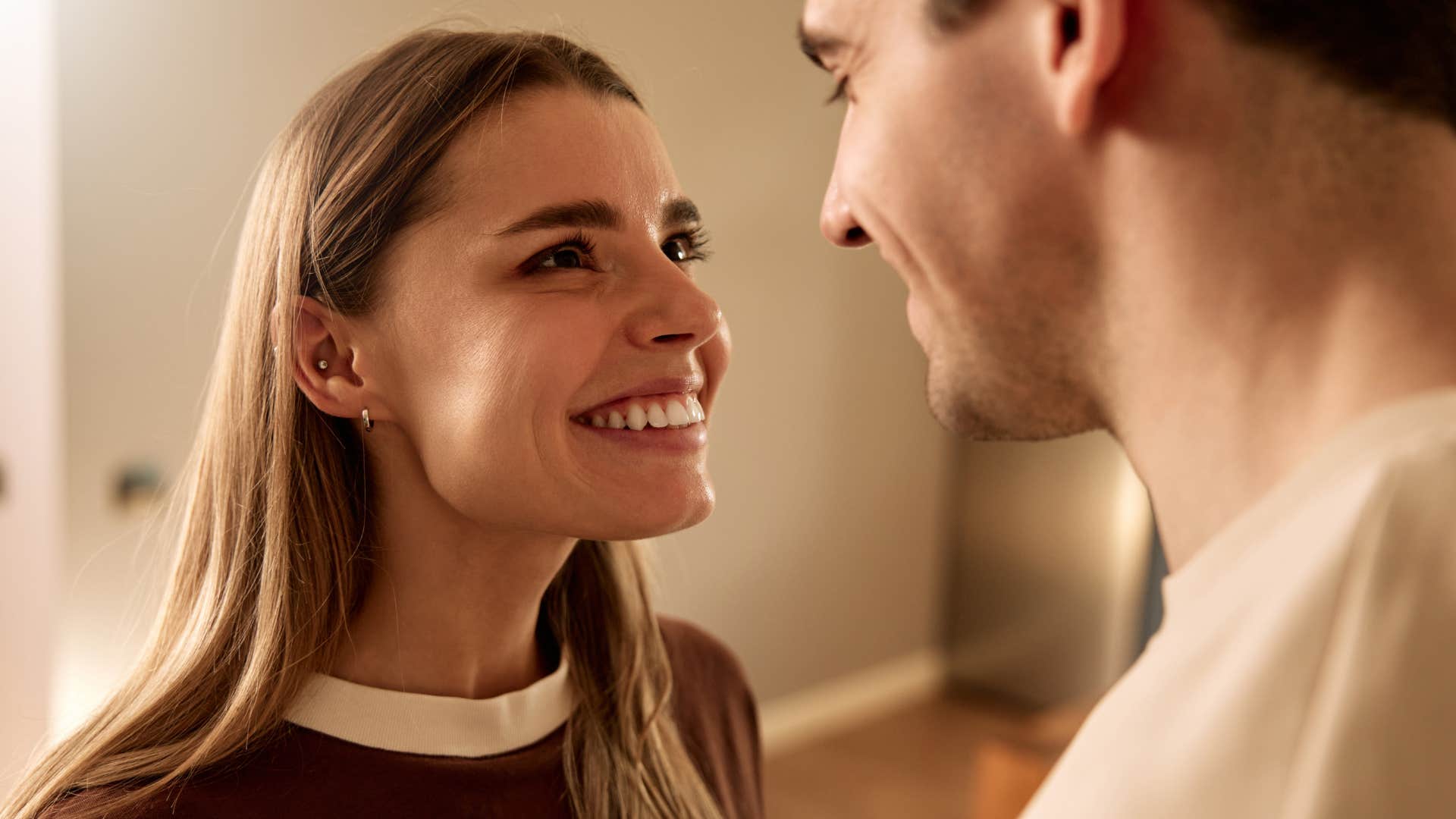 young woman smiling confidently at her partner