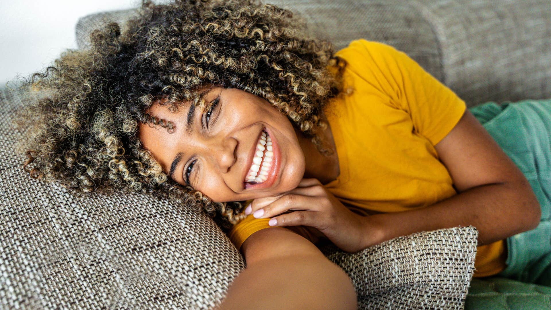 relaxed woman under 50 realizing that not everything is urgent