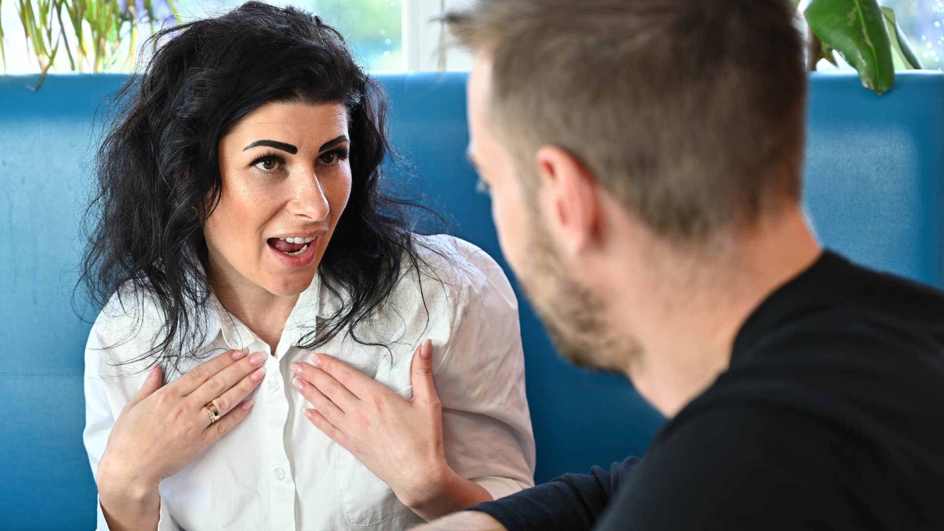 young woman not caring about man's opinion in conversation