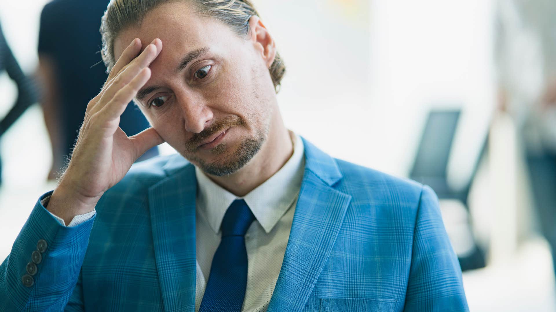 stressed businessman with a big ego saying that's beneath me