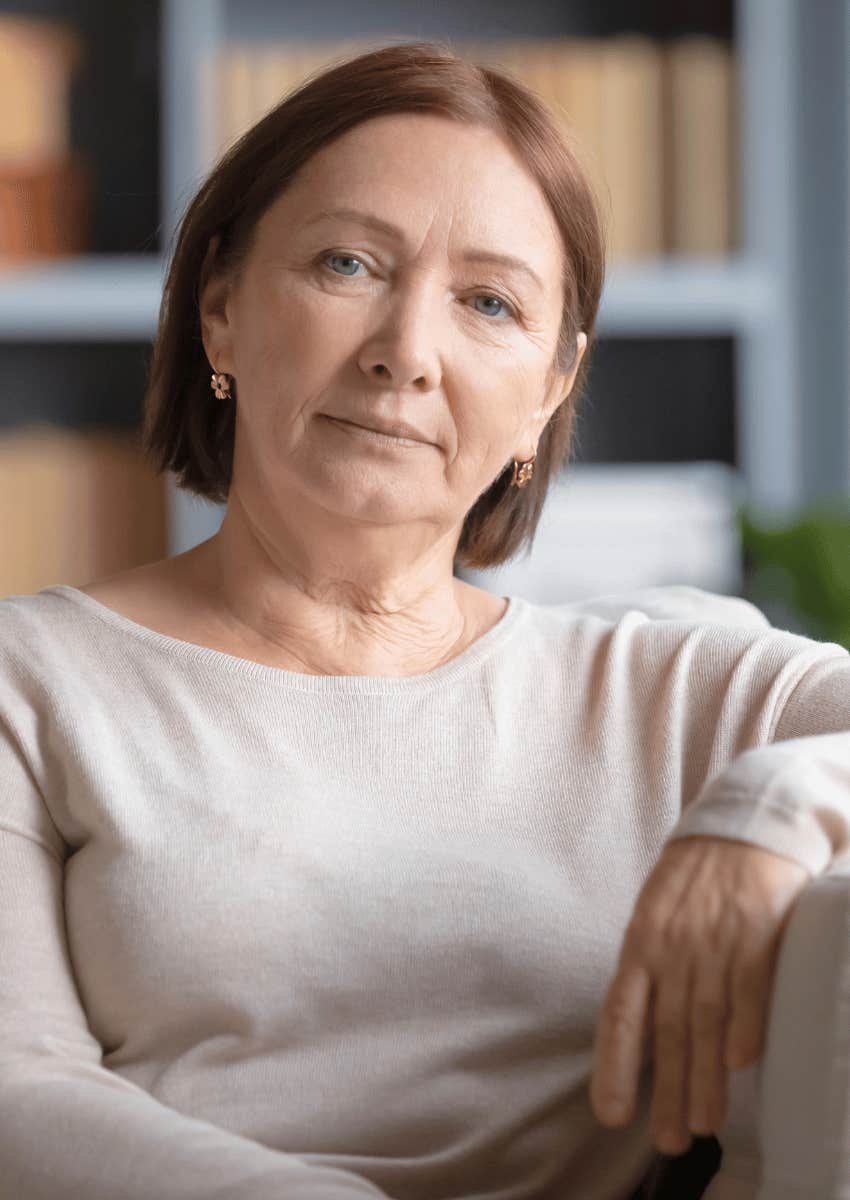 mature woman sitting alone