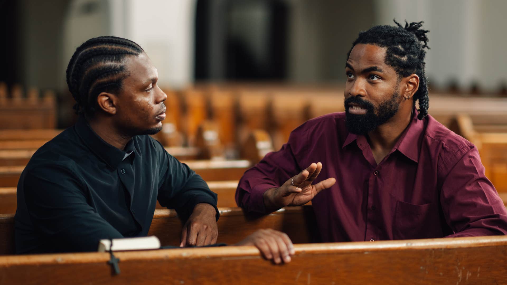 men who find meaning in masculine norms talking to each other in church